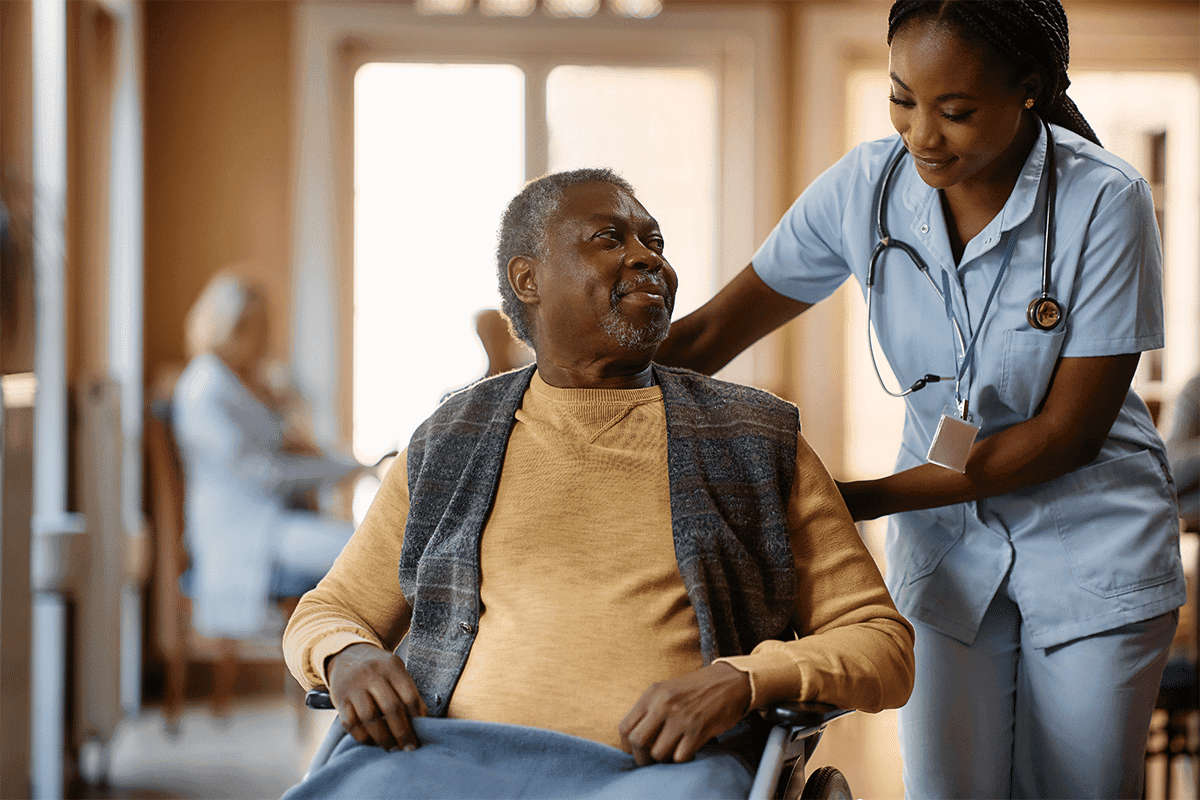 A nurse supporting a patient